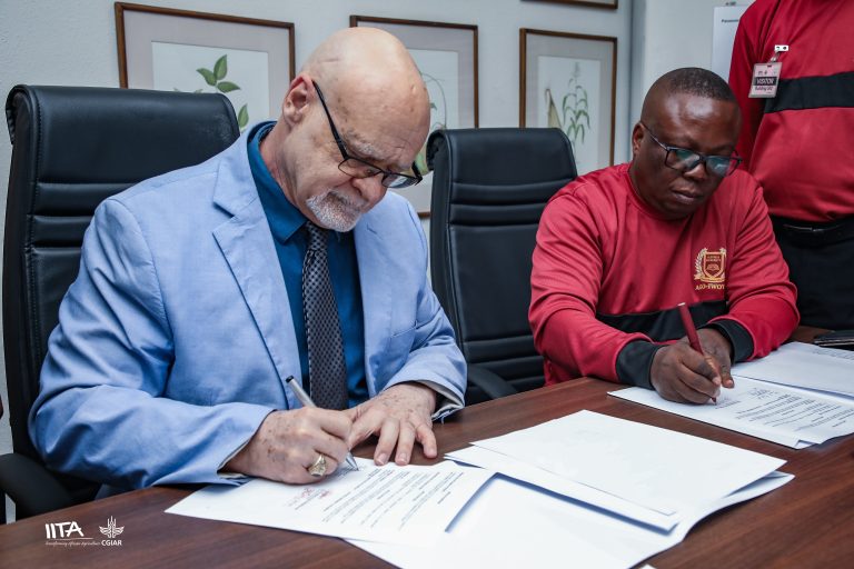 Dr. Kenton Dashiell and Aletheia University Vice Chancellor Prof. Amos Onasanya signing the MoU