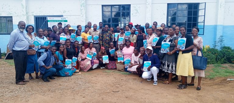 Participants and facilitators at the end of the training session